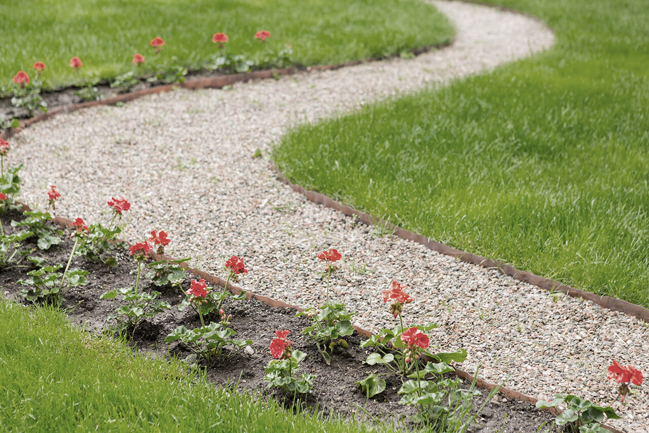 crushed granit garden path with flowers