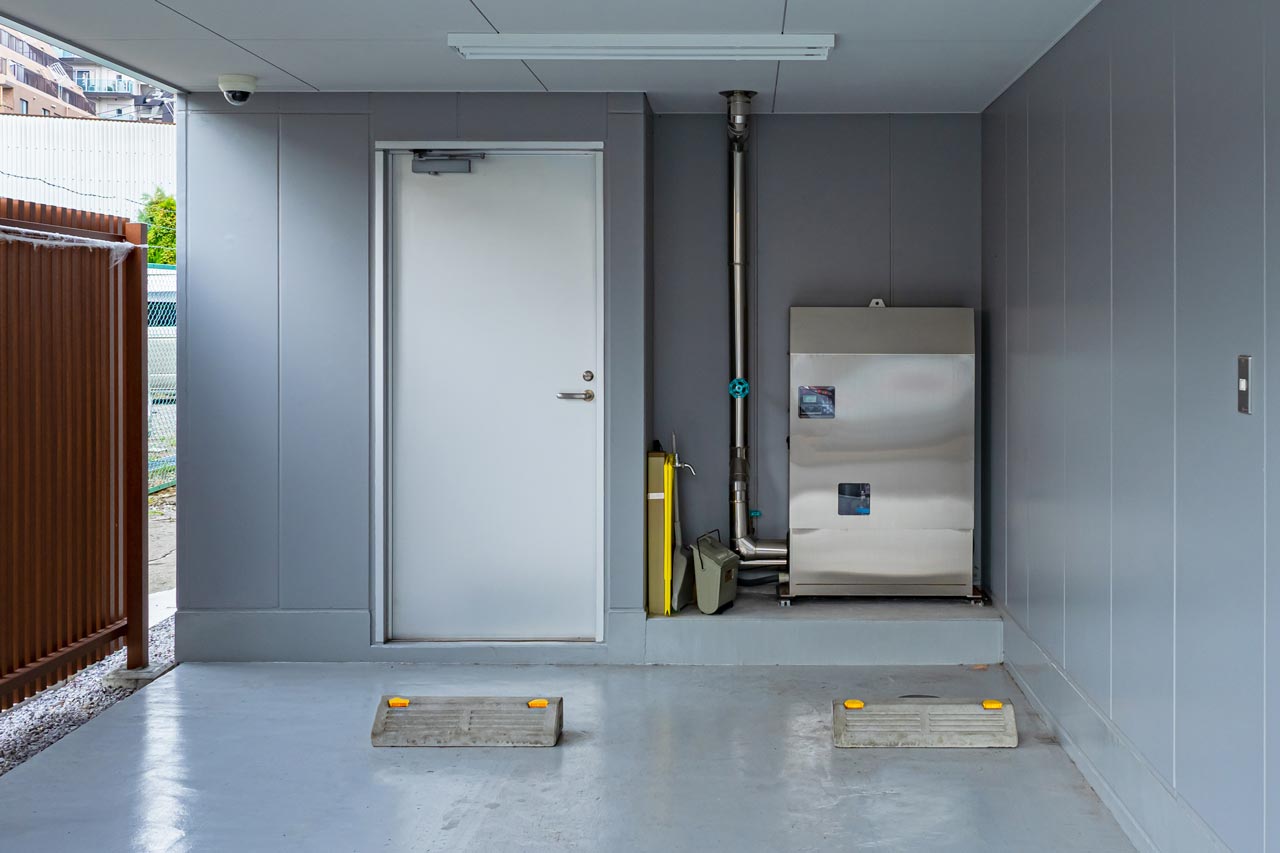 A furnace installed in the back entrance of a house