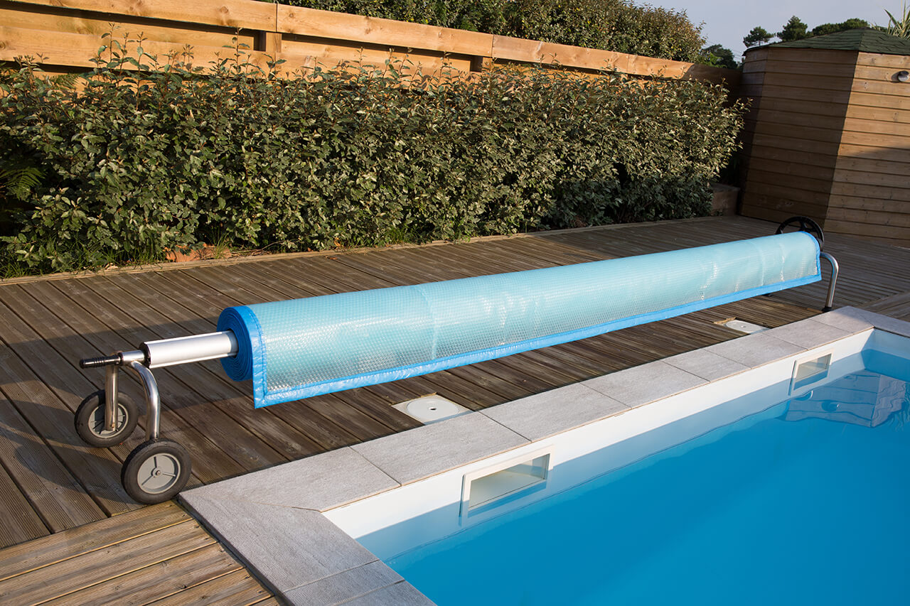 swimming pool with pool cover installed