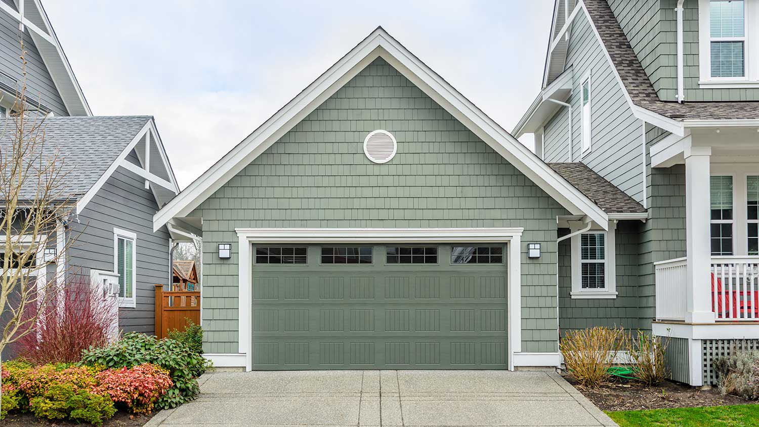 Pretty green garage and garage door