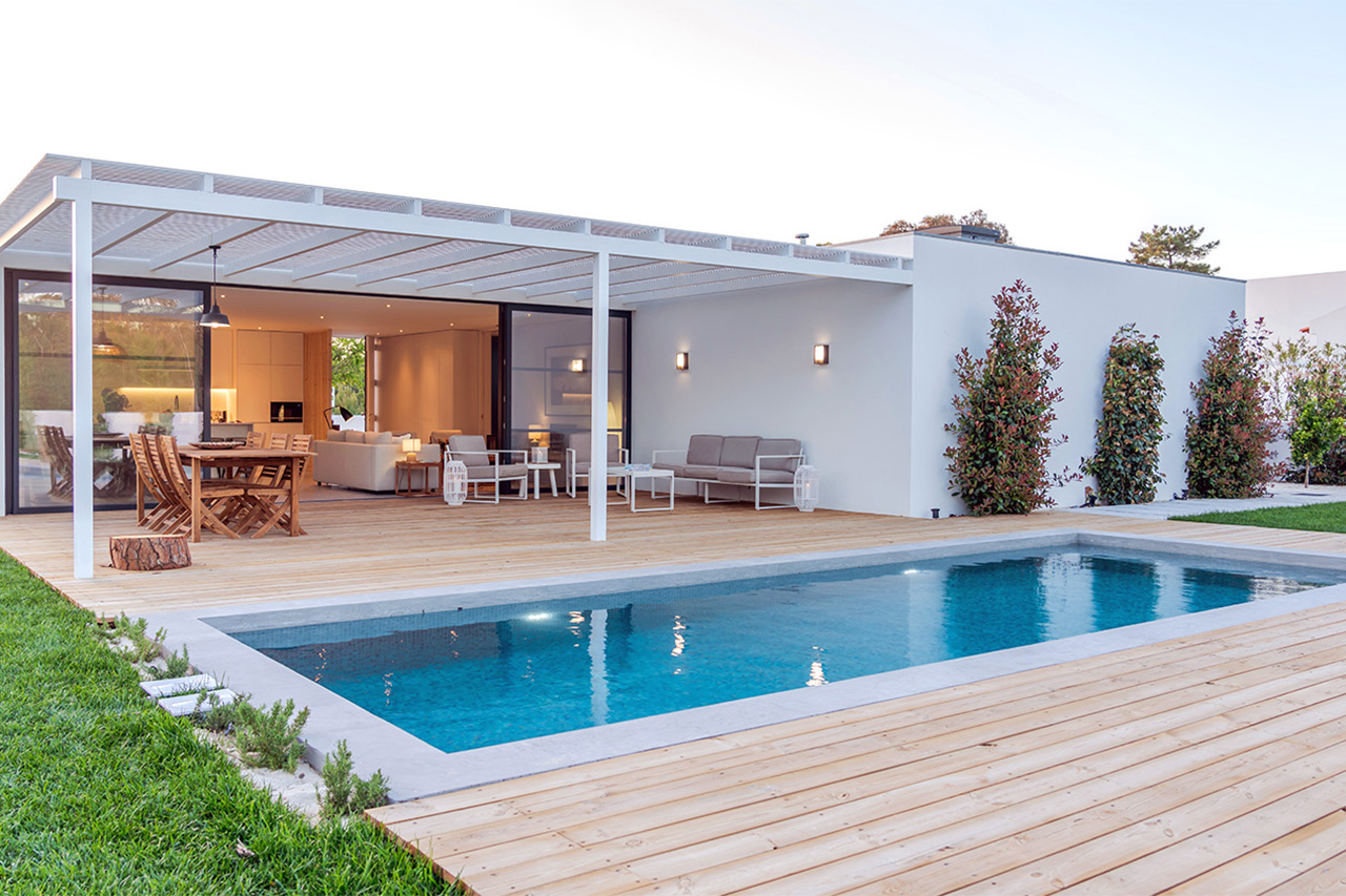 large luxury house with inground pool in yard