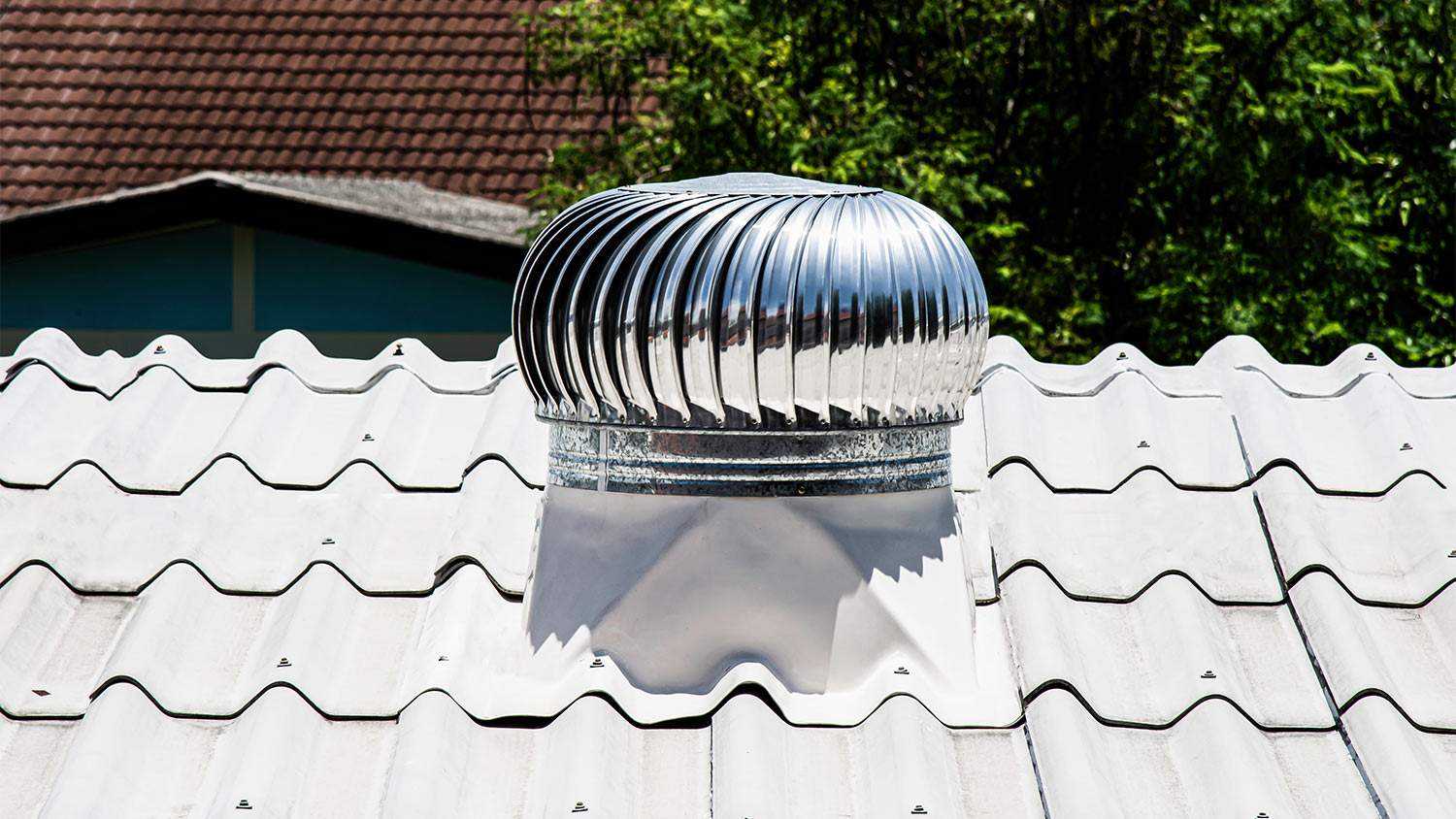 Metal roof with silver vent