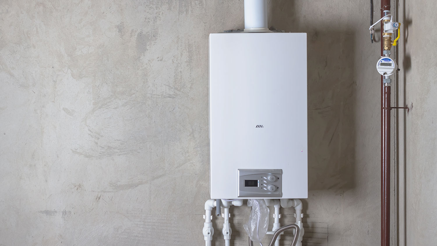 Tankless water heater installed in the basement