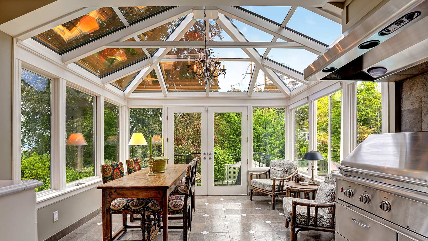 Sunroom with vaulted glass ceiling